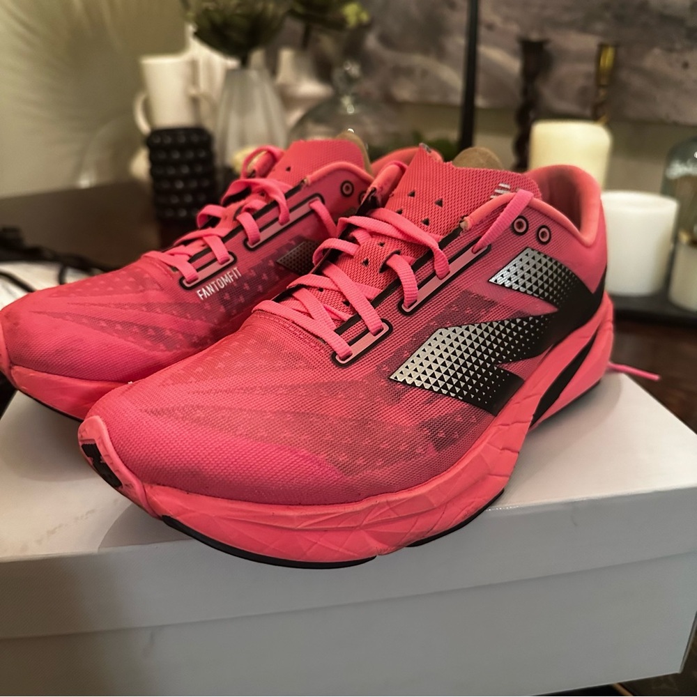 Men’s Pink Fuel Cell Rebel v4 running Athletic Shoes